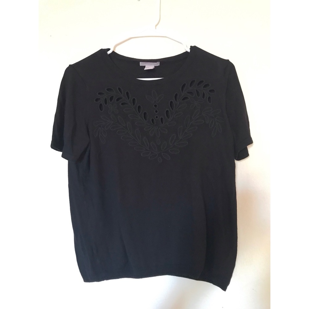 Black H&M blouse with cut out detailing.